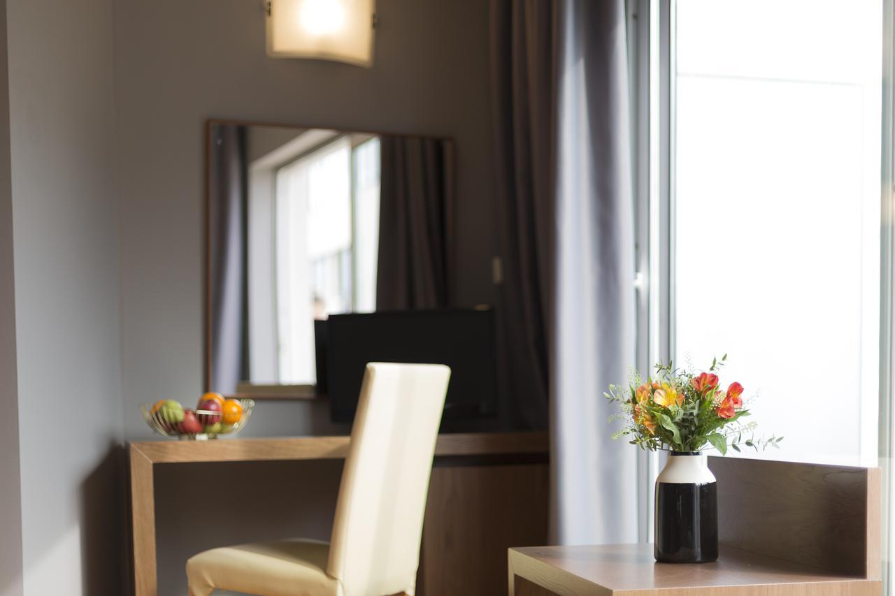 Suite met Queensize Bed en Uitzicht op Zee